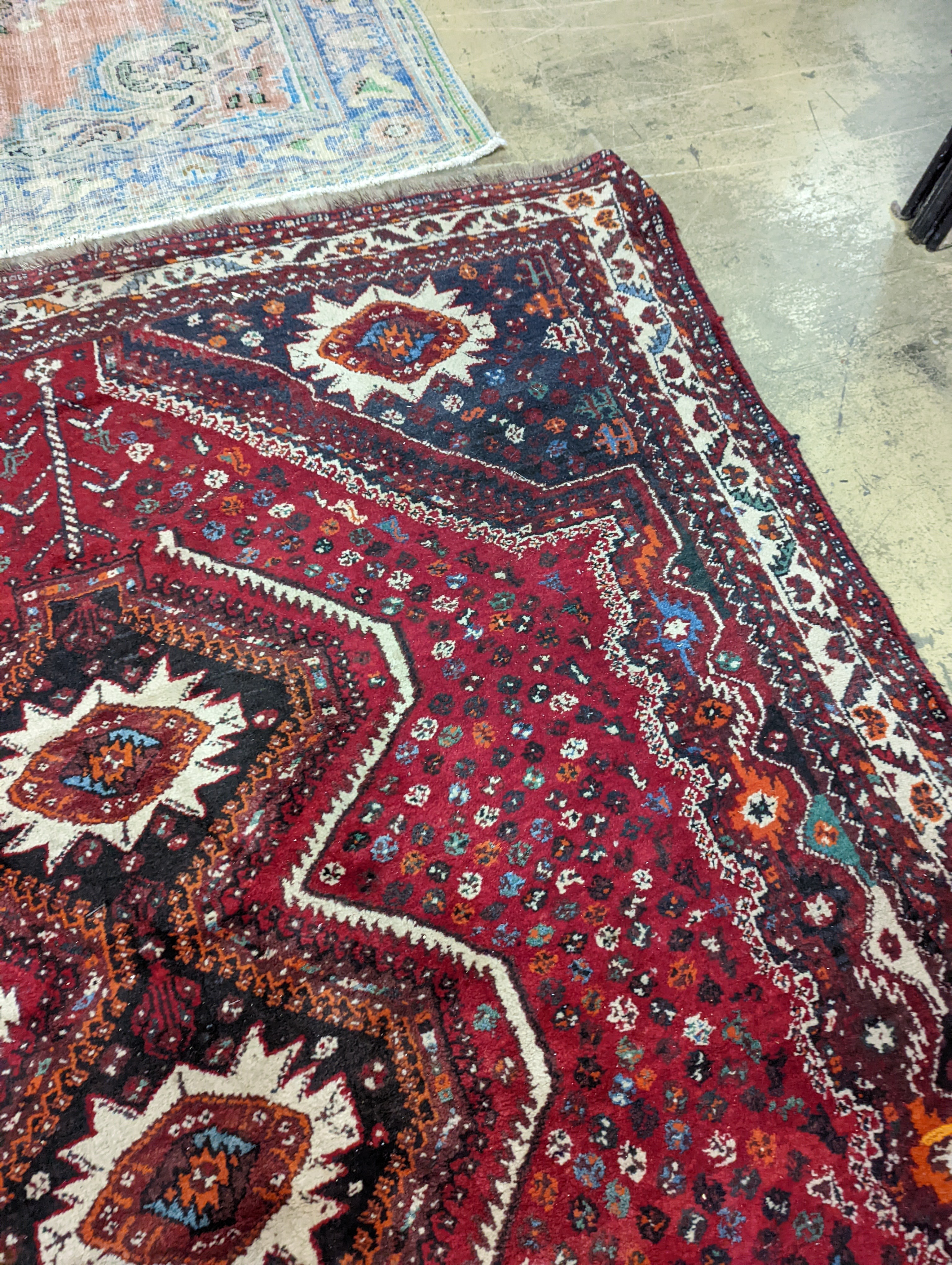 A North West Persian red ground carpet, 335 x 220cm